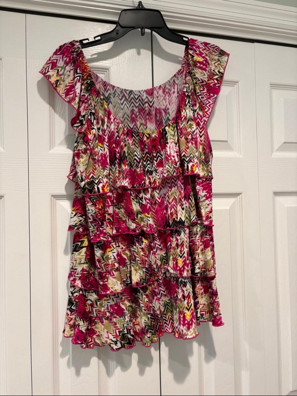Ruffled Chevron Print Sleeveless Top in Fuchsia